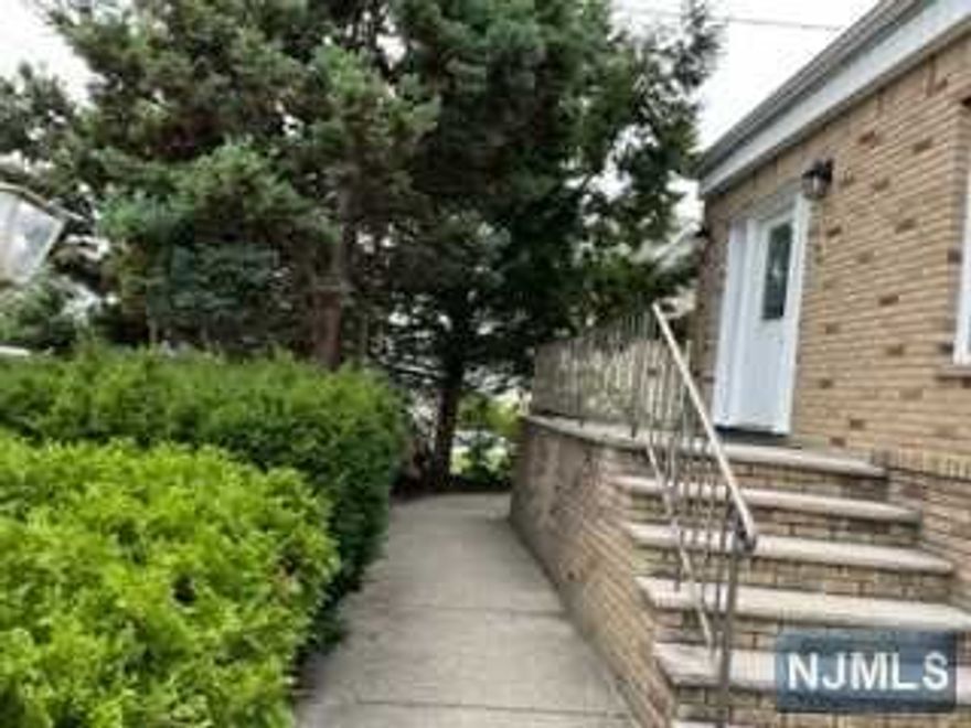 GREAT Location!! House is conveniently close to the train station, a short walking distance. NY bus stop is one block away. Commuter's dream house! Freshly painted all inside the house. First level, entrance foyer is largely spacious, super large living room has sliding door leading into the extra-large deck. Living room, two bedrooms are good sizes with mirrored closets. Fireplace, open kitchen with lots of cabinet spaces and a brand new oven. The washer & dryer are conveniently placed on the 1st floor right next to the kitchen (washer & dryer will be replaced with new ones). With the large windows on the first floor, it brings in natural light making the rooms all bright. Second level offers master bedroom with master bathroom. Finished full basement with a bar, making this space into however you want such as family room, storage room, home office, recreational room, etc. Come & see for yourself and make this house your Home Sweet Home!