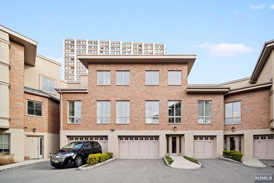 PALISADES POINTE- RESIDENCE 210 Located on the 2nd floor, unit #210 offers 1510-sf finished in the most exquisite manner with tall ceilings, floor-to ceiling windows, oak hardwood floors, and an open plan kitchen with granite and stainless steel appliances. This very special floor plan offers two bedrooms including a primary suite, second bedroom with its own ensuite full bath, PLUS a large home office/guest room with an adjacent 3rd full bath on the main level. Laundry in unit, one garage parking space with an additional driveway parking space. Easy access to NJ Transit and the conveniences of Edgewater nearby. *** Best and Final Due Monday 1/10 by 5pm ***