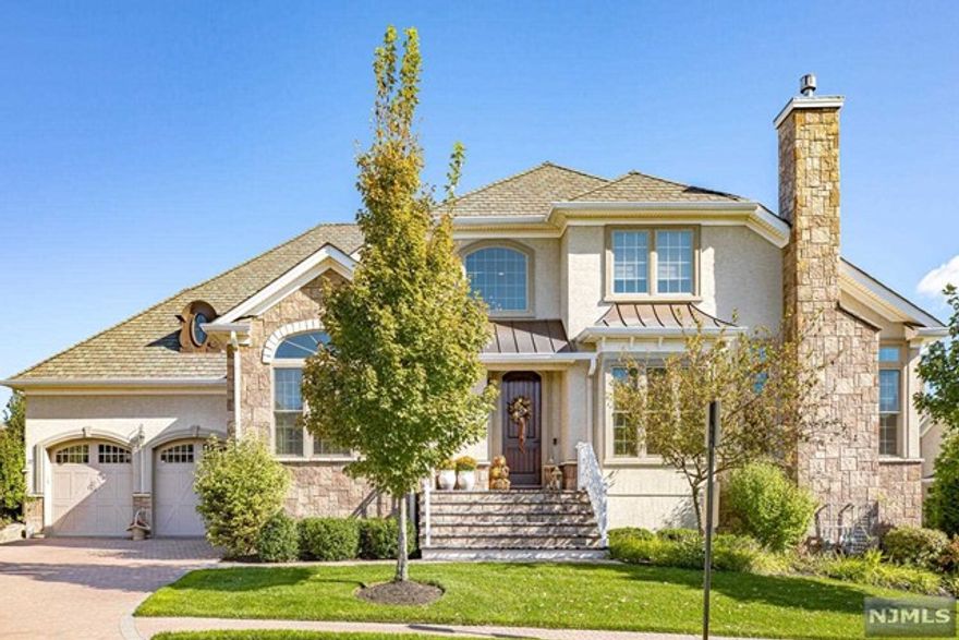 Visit this meticulously maintained end unit at the popular 55+ gated community in the prestigious Bear's Cove. Best location in the complex affords privacy yet is near all amenities:saltwater pool,new putting green,gym,sauna, clubhouse w/billiards, great room, & chef's kitchen.This luxury townhome is loaded w/builder upgrades throughout including stunning architectural mouldings. Enter through a dramatic 2-story entry to an open floor plan where you can entertain or relax in style. Light & bright kitchen w/tiered breakfast bar & island opens to a great room w/vaulted ceiling, fireplace, & windows galore. Enjoy cozy evenings on the private deck off the kitchen. Large laundry & storage area lead to a 2-car garage. Completing this level is a powder room & expansive primary suite w/full bath & WIC. 2nd floor features a loft perfect for an office or rec room, 2 bedrooms, & full bath. The possibilities are endless for the massive unfinished basement. Bonus:whole house generator!