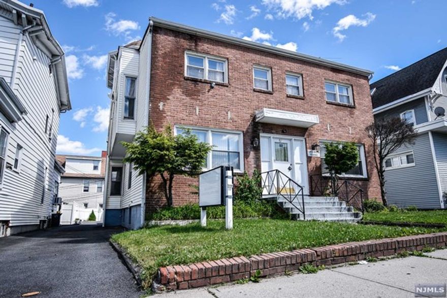 Mixed use property featuring 2 offices on the first floor and a massive 2 bedroom 2 bath apartment on the second floor. 2nd floor also features finished attic with high ceilings (estimated 193 sq ft) 1st floor offices have an estimated combined sq ft 1610 & 2nd floor has an estimated sq ft of 1709. Offices feature exam rooms, front desk, doctor's room. Newer HVAC System (3) units), (1) hot water heater, (3) electric meters, (4) gas meters. Property also features a finished basement with separate entrance