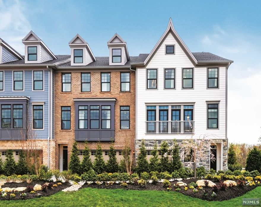 END UNIT PRIVACY AND MOVE-IN READY! This Carlough home is all about convenience, accessibility and natural light! The included elevator and open concept floor plan make this home easily accessible and the ideal space for entertaining. The corner location fronts to the South with West-facing additional windows. The great room is the perfect setting for relaxation with abundant natural light and a gas fireplace. Prepping meals is a breeze in the kitchen with a large island, ample counter space and large walk-in pantry. The Carlough's primary bedroom suite features an oversized walk-in closet and luxurious bath. The bedroom level is complimented by 2 secondary bedrooms, a shared hall bath and laundry. The finished lower level is ideal for a home theatre or workspace. Designer selected finishes include hardwood flooring throughout, upgraded cabinetry, countertops, tile, electrical and much more!