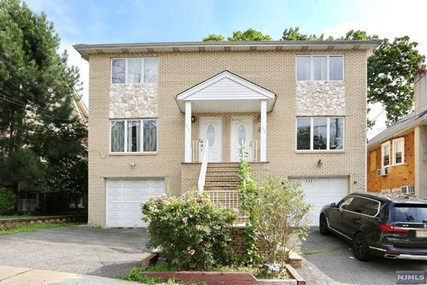 Seller will pick highest best and final offer by wednesday August 17th at 9am Beautiful Duplex Large Living room dining area, Modern eat in kitchen with sliding door to the deck, powder room, master bedroom, master bath two additional bedrooms and a full bath on the second floor, full finished walk out basement with a family room, full bathroom, summer kitchen great for entertaining. Very convenient to schools, shopping and public transportation 20 minutes to midtown Manhattan.