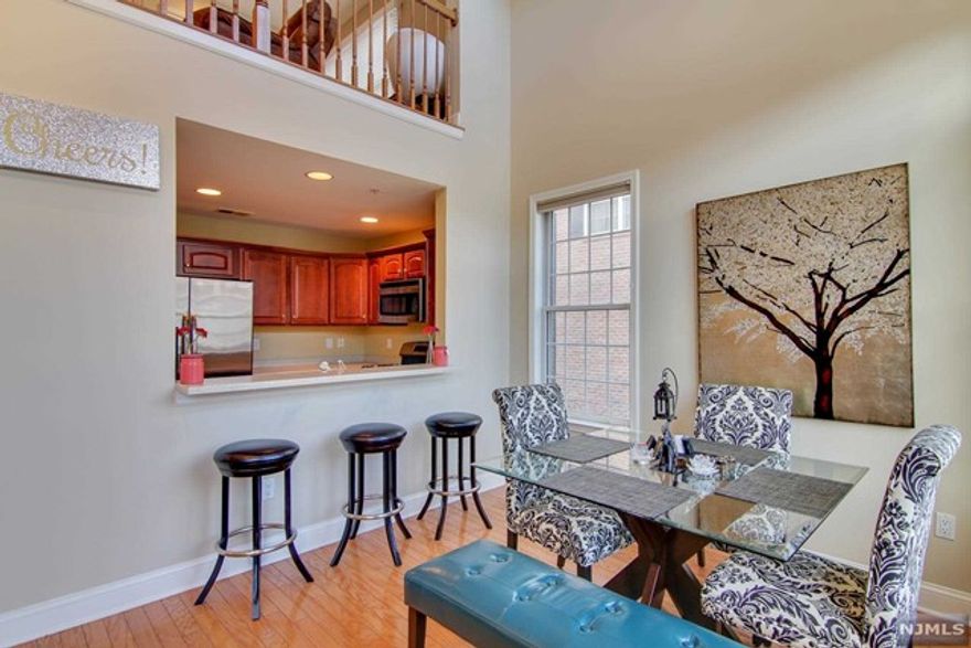 Endure in a lavish and visually stunning Chatham style home featuring 2 bedroom, 2 full bath, one half bath, and a loft area. Extremely rare corner unit boasting high ceilings, hardwood floor, and recessed lighting on a private street. This sprawling home gratifies everyday comforts stretching across 1764 sqft. A complete master suite with Jacuzzi spa-like bath, huge walk in closet and a balcony. Second bedroom is very spacious and on same level as master bedroom. An in home washer/dryer and garage parking make this home a complete! Located in Bulls Ferry, this community offers 2 pools, Jacuzzi, 24hr security, children's playground, and free shuttle to/from Ferry.