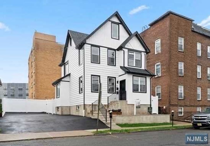 Completely Renovated 2 Bedroom Apartment Located in the heart of Rutherford. Close to everything, Restaurants, Parks, Shopping and Train is a few blocks away for access to NYC. This apartment features 2 Bathrooms and a Laundry Area. Parking Space included. This is a 2nd and third floor apartment