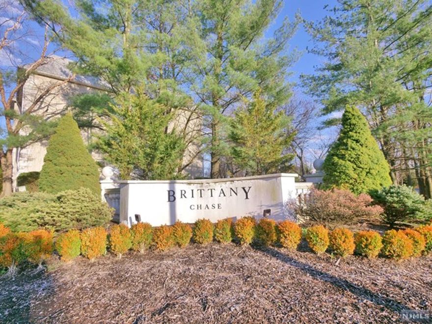 Well-kept unit in Brittany Chase featuring 2 bedrooms and 2 full bathrooms. Enter into the main living space which offers large living room and dining room. Kitchen is located off of the living room featuring plenty of cabinet storage for all of your kitchen needs. Primary bedroom offers en suite with stall shower with sliding glass enclosure and storage vanity. Additional bedroom is sizable and is currently being used as an office. Full bathroom located in the hall features tub shower and storage vanity. Laundry in unit. The covered balcony overlooks Brittany Chase grounds and is the perfect place to enjoy some fresh air. Brittany Chase offers clubhouse, gym, outdoor pool and tennis courts.
