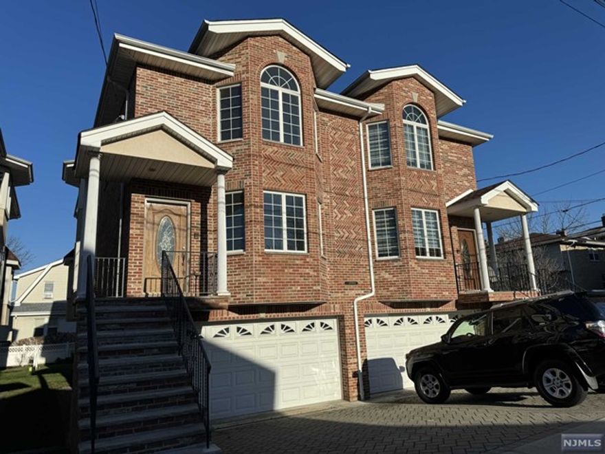 LUXURY BRICK DUPLEX ON VERY QUIET ST. FACING SOUTH,WARM AND BRIGHT, THIS DUPLEX BIGGER THAN NORMAL DUPLEX.CROWN MOLDING ALL AROUND HOUSE, LARGE KITCHEN WITH CUSTOM CABINET AND GRANITE COUNTER TOP. KITCHEN HAS SLIDING DOOR TO THE DECK, BIG FR W/ TILE FLOOR ANS SEPARATED ENTRANCE AND SINK, CENTRAL AC,CV,SKYLIGHT,PAVED DRIVEWAY.WALKING DISTANCE TO NY EXPRESS BUS,PARK,SHOP,RESTAURANT AND CHURCH. FRESHILY PAINTED ENTIRE HOUSE.