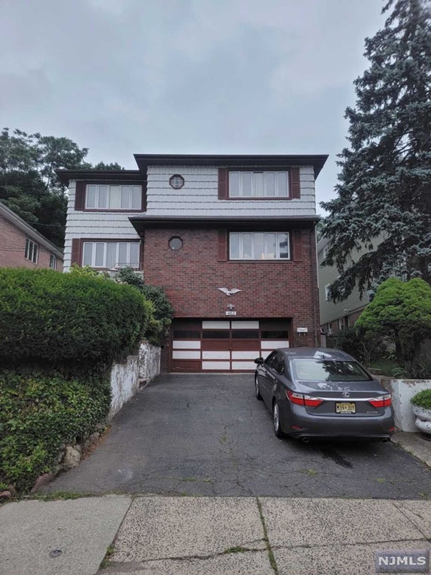 Top & bottom 2Family house is located quite residential area 3bed and 1bath on the 2nd Floor with separate entrance, All hardwood floors throughout 2 tandem parking spaces is included. House is near school, shopping and express bus stop at morning and night.