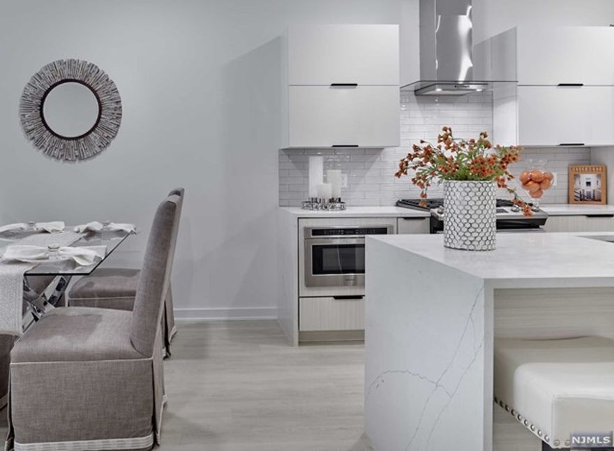 Newly constructed boutique luxury living at its finest located in the heart of prestigious Franklin Lakes. Customized to provide flexible live and work options while never compromising on style, this light and bright unit features 9 ft. ceilings, walk out patio, modern eat-in kitchens with Quartz countertops & stainless steel appliances, living room/dining area, two bedrooms including large primary bedroom suite with spa-like bathroom and walk-in closet, stylish hall bathroom and laundry. The building is loaded with amenities including fitness center, golf/sport simulator, kids playroom, movie/media room, community lounge with pool table, workstations, expansive outdoor patio with grilling stations, fire pits, dog run and dog bath. Each unit comes with one underground parking space equipped with EV charger hookup. Additional parking and storage available. No broker fee! 1 month free with a 12 month lease. 2 months free on a 16 month lease. 3 months free on 19 months.