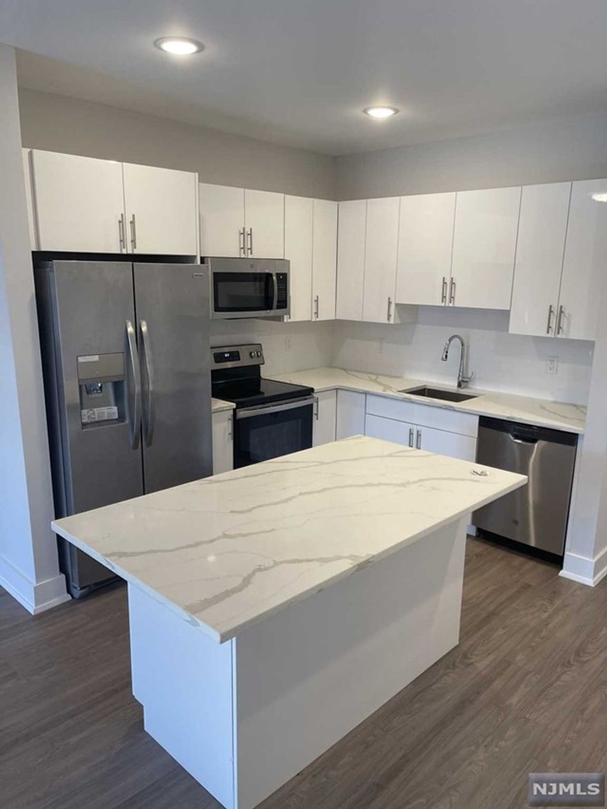 1 parking space INCLUDED, and REDUCED security to qualified applicants - Welcome to The Addison - Fort Lee's new luxury rental building offering a variety of upscale, spacious floorplans. The Addison offers high-end residences fully equipped w/ modern kitchens w/ stainless steel appliances, quartz countertops, full islands & tiled backsplashes, open living/dining areas, shades on all windows, modern bathrooms & a full-sized washer & dryer in each unit. Exclusive 24/7 virtual doorman service for communications, package deliveries & access control via video intercom system linked to your smart phone. The Addison includes a large on-site fitness center including virtual touchscreen workout mirror, electric car charging stations & parking garage w/ direct elevator access to all residences for uncompromising security. Pet friendly ! (LB limit & fees apply) Tenants pay utilities. All amenities & one garage parking space is included.