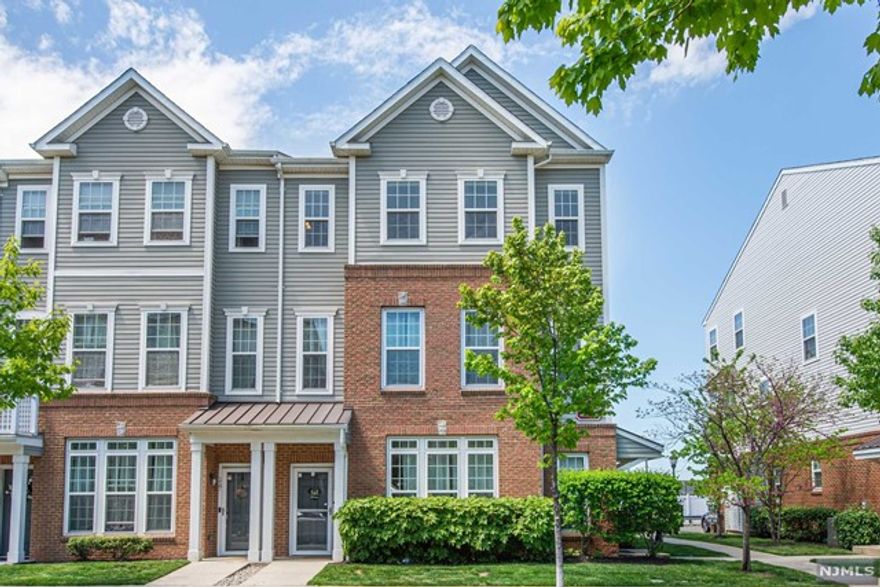 Welcome to the Stunning Townhouse in the Private friendly community of liberty Square at Wesmount station. From the Front door to the foyer area with 2 coat closets goes to the main level upstairs to the open concept living and dinning room with eaten kitchen island and half bathroom with gorgeous balcony view to the soccer field, goes up to 3rd floor with 3 Bedrooms include high ceiling Master bedroom with Master bath and 2 Walk in closets & 2 more bedrooms with full bath and laundry room. Car garage attached with one car driveway. The town offers a variety of recreational activities, including tennis, soccer, baseball, and golf.playground and picnic area . Wood-Ridge Waterfront Park Offers walking trails, playground, and a basketball court. Minutes from Route 17, Route 80 , Route 21, Route 46 & highway Turnpike.