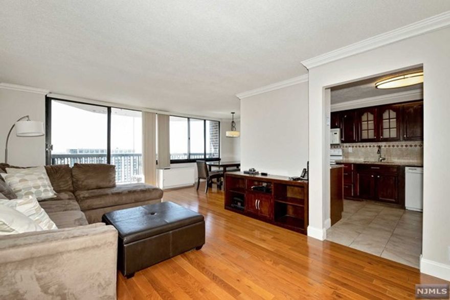 ALL UTILITIES INCLUDED. Southeast facing spacious 2 Br, 2 Ba apartment for rent featuring open floor plan, balcony with breathtaking NYC views and 1 car garage parking. Desirable floor plan with master bedroom suite with full bath, double closet and NYC views on south east side and 2nd bedroom and full bathroom on south side. Open living room and dining room and updated large kitchen complete this desirable "D" line apartment. The Greenhouse is a centrally located high rise building in Cliffside Park with 24-hour concierge, outdoor swimming pool, residents courtyard, unique "greenhouse" lobby, gym, fitness studio and club room. Furnishing is optional.