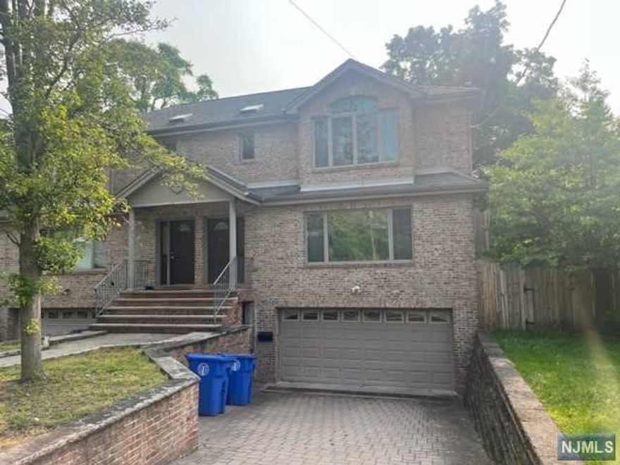 Set in the most amazing location; walking distance to Mackay Elementary, Tenafly Middle and Tenafly High School - this newer (2003) 3 bed, 2 bath duplex offers the ultimate convenient lifestyle. With a great flow, the entrance leads you to a large bright living room area, complete with gas fireplace and big bay windows which in turn open to the modern eat in kitchen and dining area. Sliding doors open to your private backyard which will feature a new patio. The second floor boasts 2 generous sized bedrooms which share a hall bath, and a primary suite with walk-in closet and en suite bath. In the basement you will find the laundry room, a rec room and access to the 2 car garage. This is a great home!