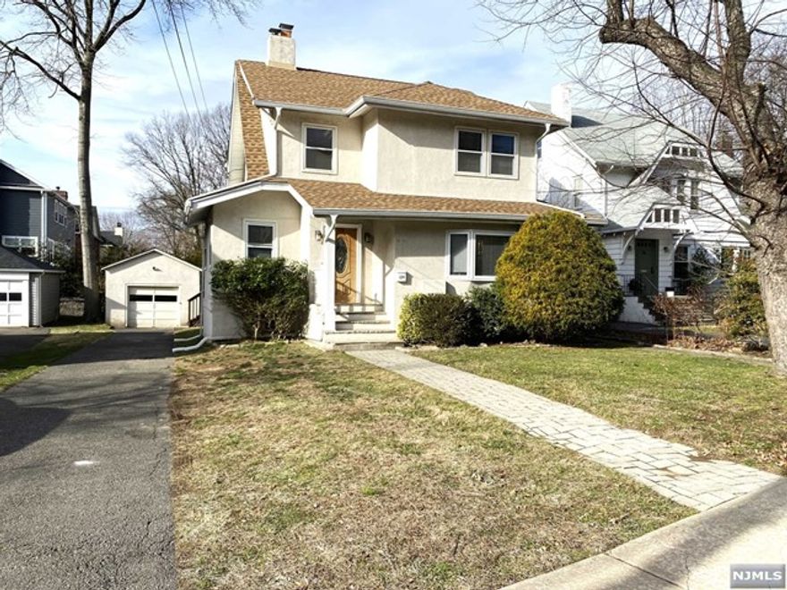BEST LOCATION IN LEONIA. ALL HARDWOOD FLOOR THROUGHOUT. PORCELAIN TILE ENTRY FOYER AND FRENCH DOORS. LIVING ROOM WITH A BRICK FIREPLACE. UPDATED OPEN KITCHEN HAS GRANITE COUNTERS AND STAINLESS STEEL APPLIANCES, LEADS TO HUGE DECK. EXTRA OFFICE/GUEST BEDROOM. MASTER BATH WITH SKYLIGHT. FINISHED BASEMENT HAS KITCHEN, RECREATION ROOM, FULL BATH, BEDROOM, AND SEPARATED ENTRANCE. FINISHED ATTIC IS A BONUS. 1 CAR GARAGE WITH LONG DRIVEWAY CAN PARK 4 CARS. CONVENIENTLY LOCATED WITHIN WALKING DISTANCE TO NYC BUSES, SCHOOLS, AND SHOPPING. SMALL DOG MAY BE CONSIDERED.