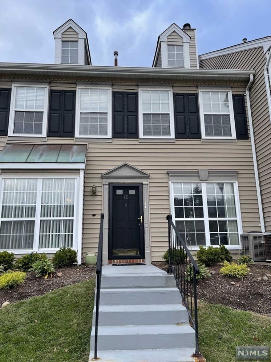 WHY RENT IF YOU CAN OWN This 2 Level Lovely Townhome with lots to offer, Second level with 2 great size bedrooms with laminate flooring and other bedroom with carpet, full bath , First level offers Cozy Large Living room with office space, Great size kitchen with granite counter top, Dishwasher, Refrigerator and oven gas stove, separate dining area, washer/dryer inside unit, lots of storage,Lower taxes, Assigned parking, close to all public transportation, Penn Station, Hospital, Shopping, Campus, 24 hr security-with , close to Rutgers Newark, not a drive by, MUST SEE