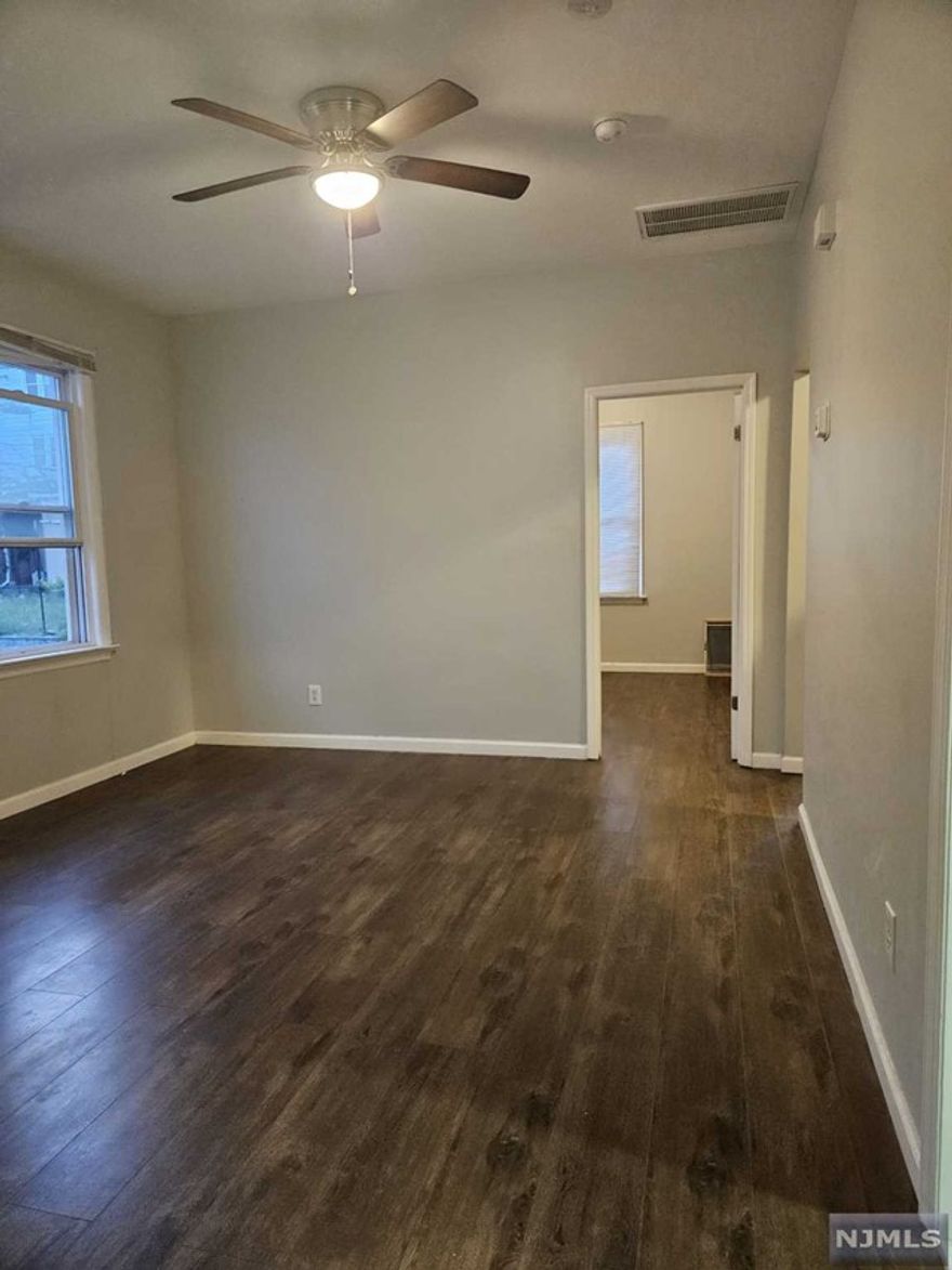 Bright & sunny very specious 2-nd floor 2 bedroom /1 full bath unit with acces to storidge space in attic & use of the backyard.This unit has nice large eaten kitchen with 1 year old refrigirator.The main bedroom fits king size bed and has two nice closets.One of the them is walk in with window). Hardwood floors in the rooms & kitchen,bathroom has tile fooring.Central Air.No washing machine.Close to transportation,shopping,schools.Parking is available in the driway & street parking.Unit is in move in condition.