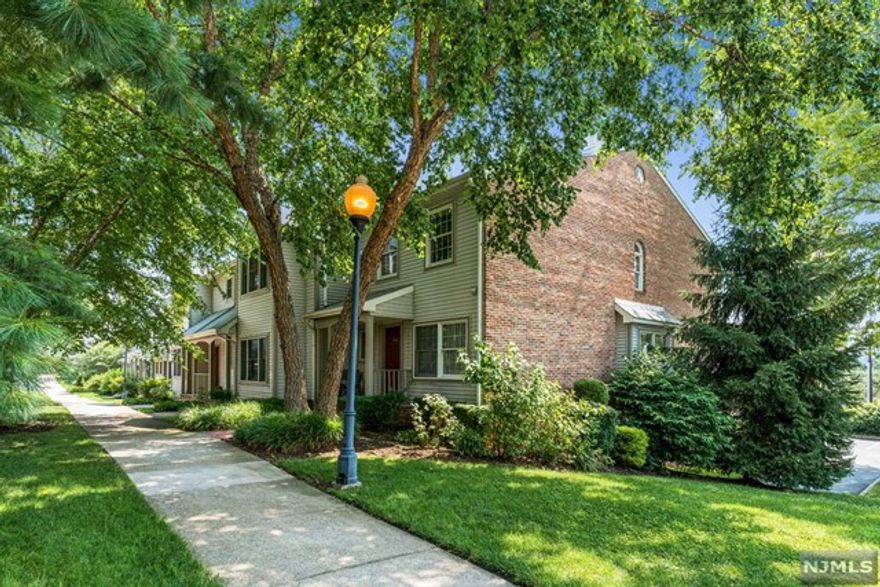 Welcome to your new home! This rare and affordable end unit townhome has unobstructed east and south exposure! This home has been well maintained, offers an east facing terrace, a west facing private front porch, and a private attached garage! Enjoy three story living with 3 large bedrooms, 2 with ensuite baths and an extra half bath. There are hard wood floors in the main living area and wall to wall carpet in the bedrooms. The kitchen has an eat-in dining area, and you can enjoy the lovely fireplace in the winter months!! This is a well maintained community and the HOA fee is low!! The NY Waterway Ferry is right down the hill as are NJ Transit buses! Enjoy the many shops and restaurants all in walking distance as well as the Hudson Walkway!