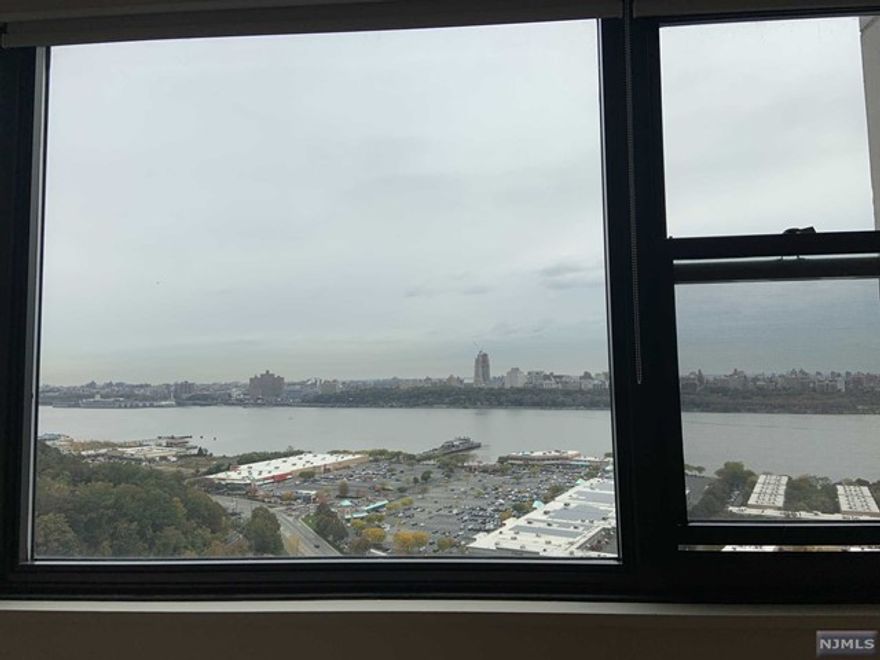 Modern Luxury Building perched high on the Palisades in Cliffside Park-BRIGHT 1 bedroom and 1 full bath condo on high floor-Spectacular full unobstructed NYC river views from every room-living room, bathroom, landlord is offering low rent since tenant may opt to paint the apartment w a true piece of tranquility- Enjoyable lifestyle -Timeless design meets Classic Cool- This home will be your favorite destination. The rent includes outdoor pool, fitness center, yoga studio,Sundeck,Lighted Tennis Courts, Barbecue area, 24 hour concierge and 2 outdoor parking spaces included with the monthly rent- High speed internet-Prime location for commuters-Bus stop in front of bldg and ferry bus across the street. Nearby shopping and restaurants- Board approval required credit score min 700.
