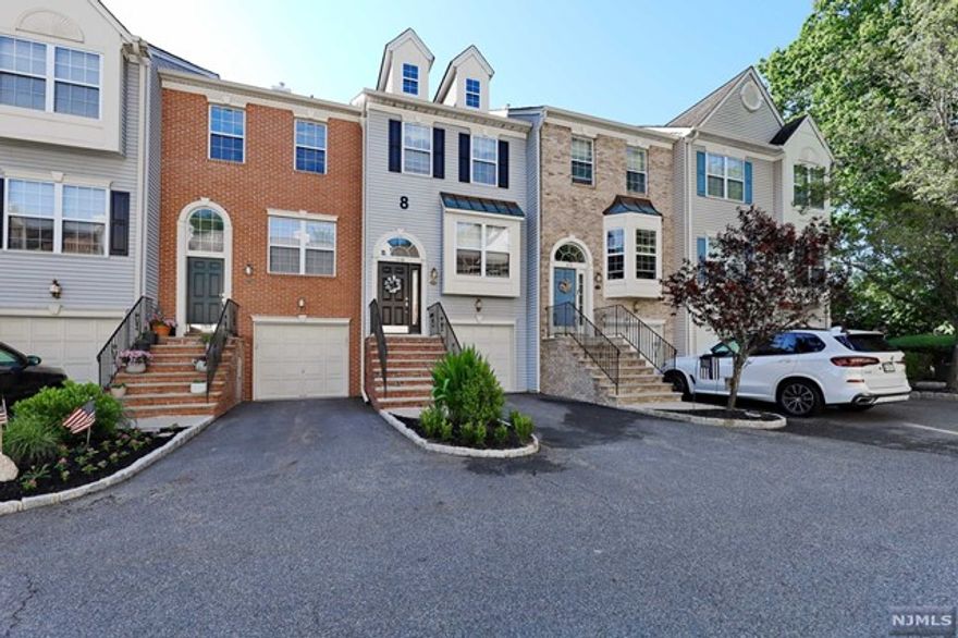 Well maintained Cambridge west townhouse in a sought after location in the complex. Garage on the ground level leading to a Family room with exit to the back. Main level offers living room with wood burning fireplace and door to the balcony, powder room and kitchen with newer appliance (hardwood floors throughout). 2nd level has a bedroom with a full bath with a tub, enclosed laundry area, primary suite with a full bath and double closet. Newer HVAC. Access to community pool and basketball court.