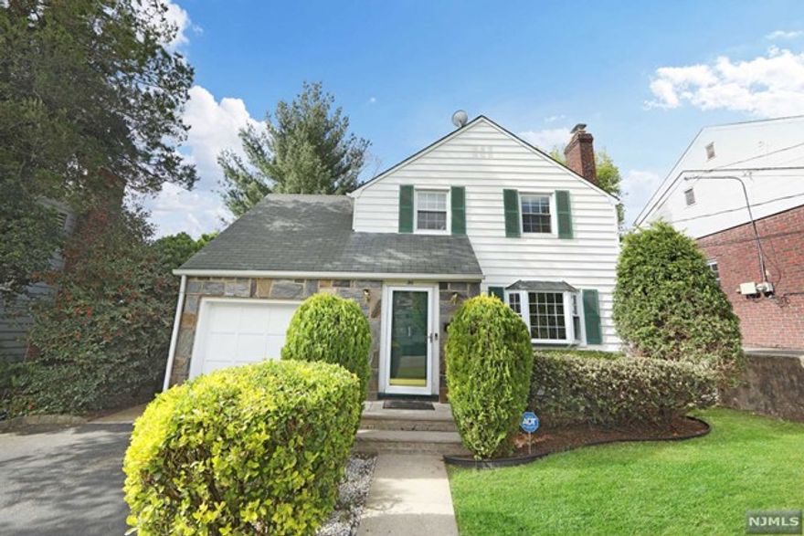 Commuter Dream ! Great Opportunity to get a great house in one of the beat area of Teaneck. Colonial - approx.1700 sq. ft. on a nice lot, all fenced. Bus stop to NYC just around the corner ! 3 bedrooms and 1.5 bathrooms. Ground floor features a kitchen , dining area, living room and a den/home office and half bath . Second floor features a large master bedroom ,2 additional bedrooms and a full bathroom. Full finished basement , family area and washer and dryer . Central AC . Close to shopping, parks and houses of worship.