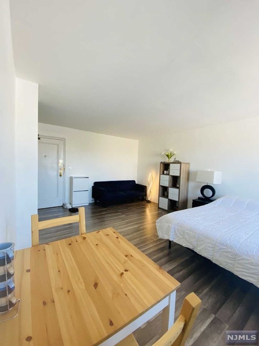 Welcome to this cozy and bright studio with a fantastic location. Located on Boulevard East, this studio apartment with new hardwood floors offers tons of natural light and the opportunity to stop paying for a room and get your own apartment! Common amenities include Elevator, 24hr concierge, a laundry and exercise room. Walk out to the beautiful promenade along Boulevard East to watch the sunrise over the NYC skyline. 1st Month of rent, 1 Month Broker Fee and 1.5 Sec Deposit Applies.