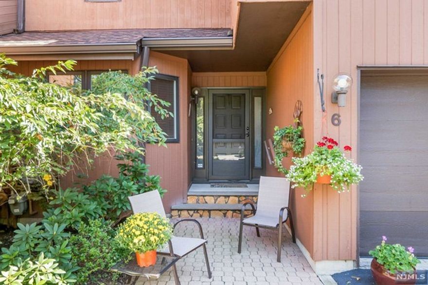 Tons of natural sunlight in this spacious rare Birchwood Model in the sought after Woodlands Community. Large kitchen, high ceilings, finished walkout lower level and tons of closet storage are just a few of the features this wonderful home has to offer. The only model in the community where the kitchen opens right off the deck. Perfect for entertaining and grilling. Great location near clubhouse, tennis and pool. Conveniently located near NYC transportation, dining, shopping, recreation, houses of worship and major highways. Just minutes away from fabulous Montclair. This townhome is waiting for you, bring your own decor and enjoy all the community has to offer.