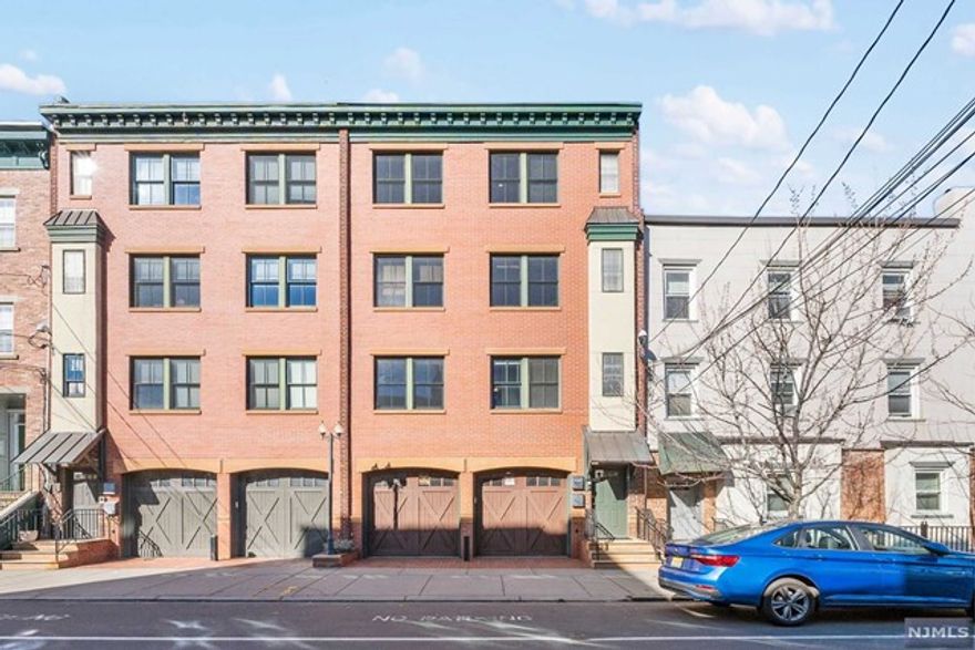 Welcome home to this beautiful, modern 3bd/2.5ba duplex condo with garage parking in Downtown Jersey City! This home offers central air, recessed lighting and hardwood floors throughout. Open concept first level boasts kitchen with stainless steel appliances dining room, living room, powder room and a first floor patio as an extension of your hosting space. Move upstairs to the second floor to the sunny South-facing primary bedroom with en-suite bath. Two more queen-sized bedrooms on this level, one with private balcony and an additional full bath. Washer/dryer in the upstairs hall for added convenience. Modern touches offered are Nest thermostat and Ring doorbell as well as an-internet connected motorized garage door. Stellar location near Hamilton Park (farmer market), Grove St PATH, groceries, restaurants, cafes, nightlife and the Newark Ave Pedestrian Plaza!