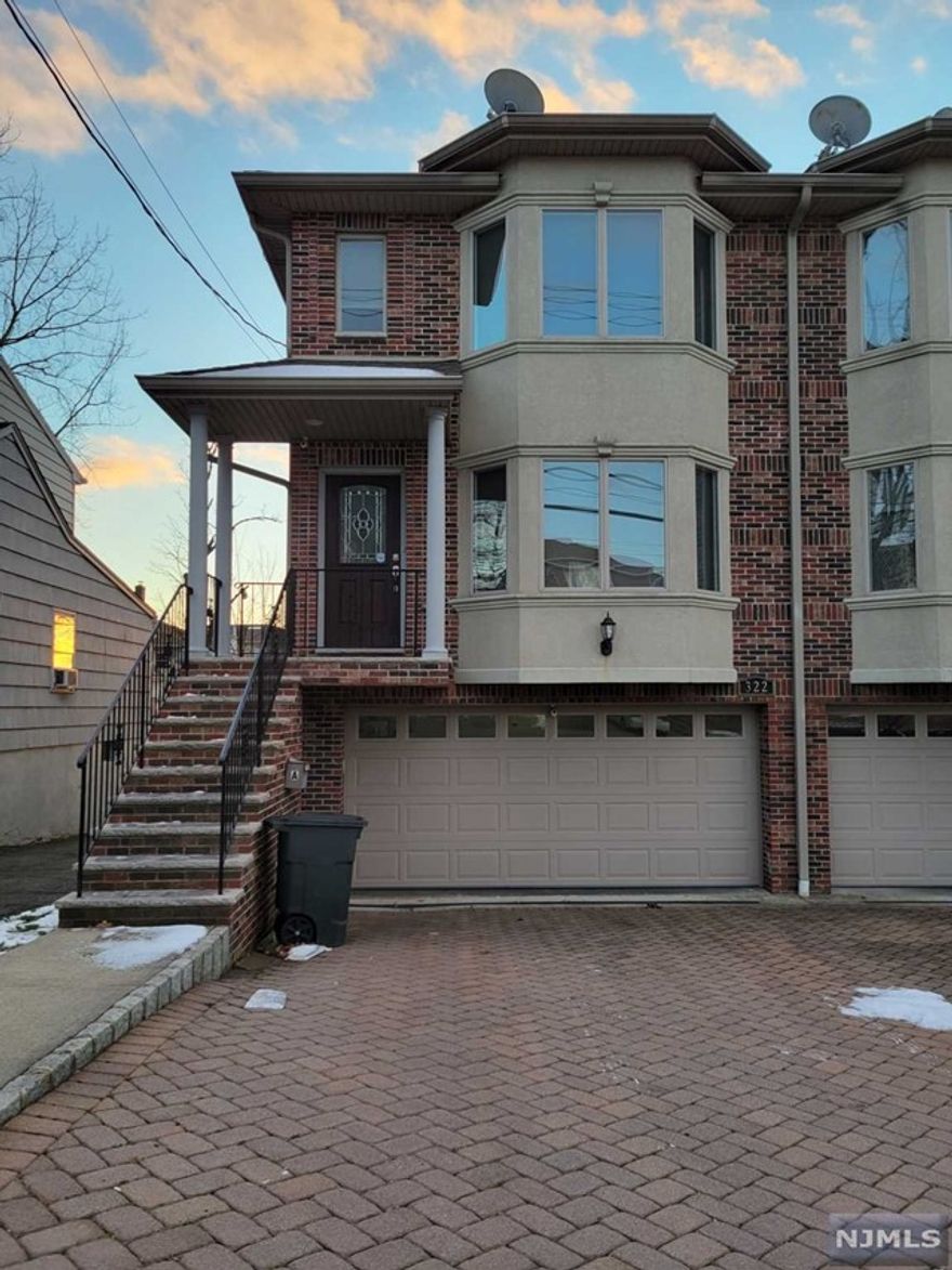 Great location with walking distance to shopping and NYC bus. Brick duplex with open layout. Finest materials. Granite countertops, stainless appliances, central air. Vacant 2 car garage. Paved driveway. Hardwood floors with in-unit laundry and additional kitchen in basement.