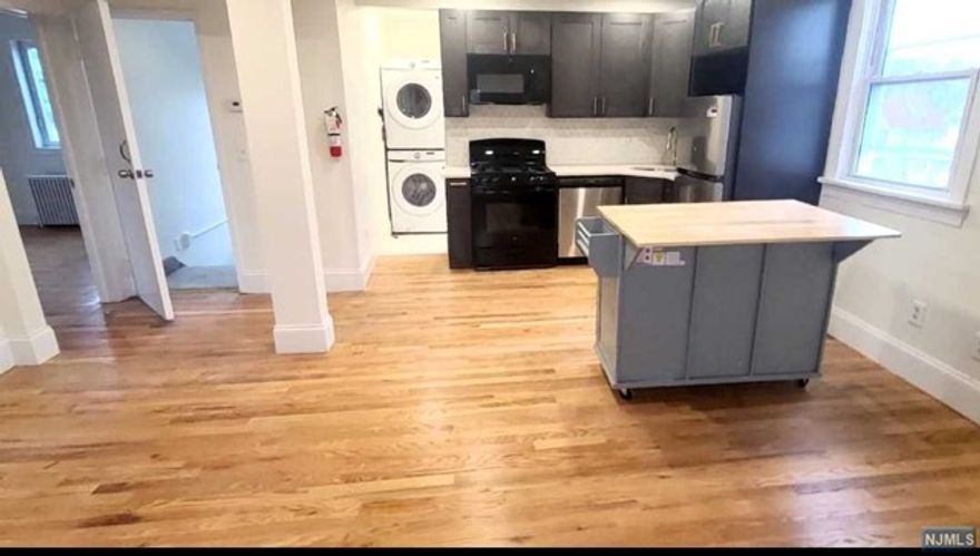 Totally renovated 2 bedroom apartment like Brand New on the 3rd floor, Sunny and bright, New hardwood floor in the living room & kitchen and re finished hardwood floor in 2 bedrooms, new tiles , vanity, & tub in a new bathroom, new kitchen cabinet, new quartz counter tops, new stainless steel kitchen appliances, a portable island, new washer & dryer, 1 parking space $100/ month extra in the back of the building . Gas, cold & hot water included in rent ,separated electric,3 New split units of HVAC , close to the Main street, Aldi super market, Target, NY Bus, shopping, Sears, worship, restaurants, cafe, train station, court ,separate entrance for both apartments of the Mixed used building. Credit 740+ NTN report , proof of income 4:1 ratio, initial checks must be certified.1.5 moth security deposit & 1 month broker fee paid by tenant, ***NO PET, NO Smoking in the unit***