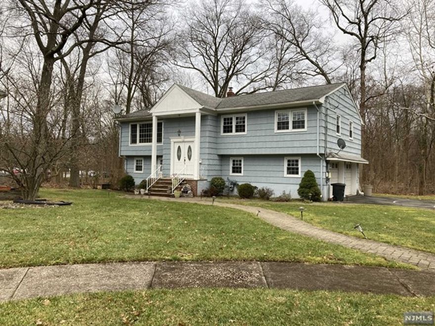 SHORT-TERM RENTAL IS AVAILABLE WITH TERMS; 1 MONTH SECURITY DEPOSIT. This Renovated, clean and extra big House with the huge backyard is located on a Dead-End street and Desirable location, Blue Ribbon School System (one of the Best Schools in New Jersey), New Paint, clean hard wood on the second floor, all Marble Tiles on the First floor, Kitchen has all the Stainless Steel silver appliance. Silver Washer Dryer on a separate room. The tenant would be responsible for the first $250 of each repair. 1 month Real Estate fee, Seeking ONLY Non-smoking tenants, PETS are allowed to live.