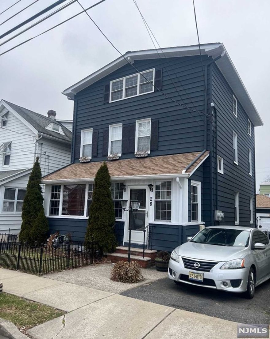 Gorgeously updated rental in a two-family home. This rental is on the second and third floor of the house. When you walk into the apartment you are greeted with stunning wood floors in the dining area, that is next to the breakfast bar, in the beautiful, updated kitchen which features stainless steel appliances, including a built-in microwave, dishwasher, refrigerator and washer/dryer. There are also 2 medium-sized bedrooms on this floor, as well as a full, updated, bathroom with exquisite tile work and a double vanity. Upstairs is the huge master suite, with plenty of closet space and larges windows, allowing natural light to shine in. Tenants will have shared use of the backyard. On street parking only, separate utilities, NO PETS. **LISTED WITH A REAL ESTATE AGENCY. OWNER PAYS HALF OF THE ONE MONTH BROKER FEE** Credit check, proof of income and previous rental history a must.