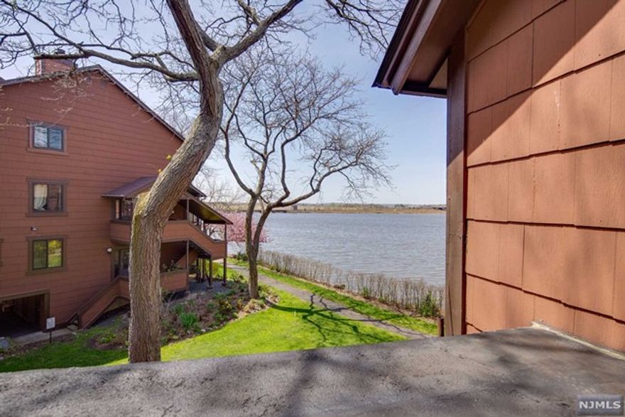 If Harmon Cove is where you want to live, and a spectacular water view is what you dream of, then your search stops HERE! Fantastic Falmouth Unit with 2 bedrooms/2.5 baths and 1450 sq.ft. of open, luxury living space. Sitting directly on the "Secaucus Riviera", you'll witness the most beautiful sunsets & river views from your private terrace. Unit features hardwood floors, continuous water tank, newer systems, central AC/heat, covered parking for 2 cars, fireplace and much more. Harmon Cove is a beautiful gated community offering many top-of-the-line amenities including 24hr security, pool area w/clubhouse with kitchen/bar, play area for the kids, basketball/tennis/pickleball courts and marina, just to name a few. Super convenient NYC transportation on site!