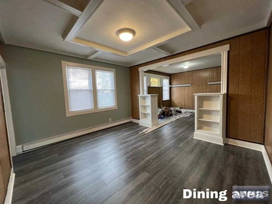 Check out this renovated spacious 5-bedroom apartment in a great spot! Five bedrooms, Two bathrooms, a living room, and a dining room give you plenty of space. You won't have to worry about parking with the two spots that come with it. Plus, it's super close to shops for easy convenience!