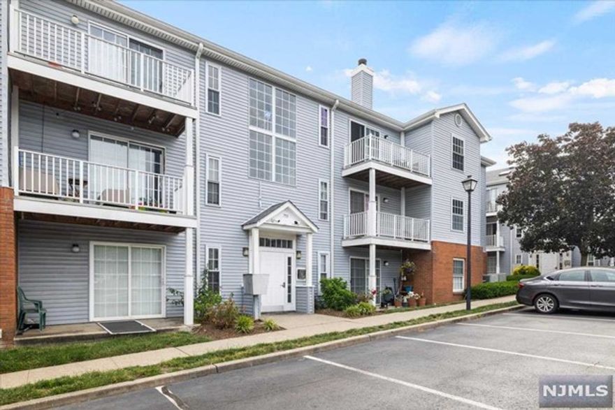 Welcome to the coveted gated Forrest Hills community! This 2-bedroom condo offers a sense of relaxation after a hard day's work. Light and airy atmosphere with an open floor plan, featuring a spacious living and dining room combination, complete with sliding doors that lead to a private balcony. Updated kitchen offers new counters, new refrigerator, stainless steel appliances, and a breakfast bar that connects to the living room/dining room, making it perfect for entertaining guests or enjoying quality time with loved ones. Charming hardwood flooring throughout adds warmth to the space. The primary bedroom includes a convenient walk-in closet. Spacious second bedroom.The sophisticated bathroom features double vanity sinks, adding a touch of elegance. In-unit laundry and assigned parking included. Convenient transportation options to NYC and easy access to Route 21/McCarter Highway. Schedule a viewing today and embrace the comfort of Forrest Hills! Seller is a licensed RE Agent.