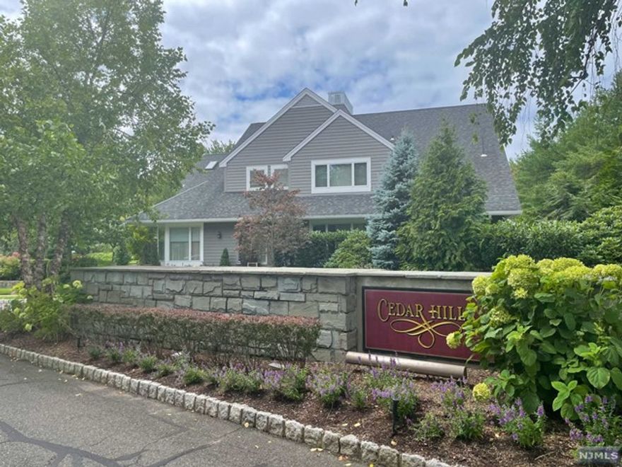 Welcome to the highly desired community of Cedar Hills! Stroll down the beautifully landscaped walkway to enter this spacious, immaculately maintained townhome. A welcoming entry foyer leads to an open floor plan consisting of dining room, den, powder room and living room with a gas fireplace and access to a private patio perfect for entertaining. Enjoy cooking in the modern eat-in kitchen with granite countertops. Upstairs there is a large master bedroom with full bath and large walk-in closet, a generous second bedroom with skylights, full bath and a bonus room/3rd bedroom. There is a two car garage with additional storage cabinets. Extra features include pool, tennis court, community clubhouse and seasonal landscaping. Close to shopping, dining and transportation. A must see!