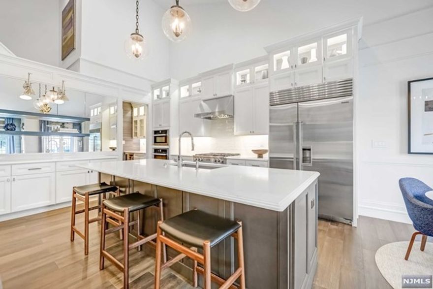 WELCOME TO THE EPITOME OF LUXURY LIVING AT THIS STUNNING TOWNHOUSE IN THE HIGHLY SOUGHT AFTER RESERVE AT FRANKLIN LAKES. ENTER THE FOYER W/ 2 STORY CURVED STAIRCASE. DR WITH BUTLER'S PANTRY, MUDD/LAUNDRY RM, AND PR. THE HEART OF THE HOME IS THE CHEF'S KITCHEN W/A CENTRAL ISLAND, WHITE QUARTZ COUNTERTOPS AND TOP OF THE LINE APPLIANCES,OPEN TO THE LIVING ROOM, BREAKFAST RM AND A COZY SITTING RM W/GAS FP. THE PRIMARY SUITE HAS A LUXURIOUS BATHROOM W/OVERSIZED SHOWER AND WIC. UPSTAIRS DISCOVER THE LOFT SITTING AREA WITH DOUBLE DOORS TO THE "OFFICE WITH A VIEW" AND BUILT-INS. TWO GENEROUSLY SIZED BDRMS, WIC,ENSUITE SINK AND ADJOINING SHOWER AREA. OUTSIDE ON THE DECK, W/VIEW-THROUGH RAILINGS THERE IS A BUILT-IN BBQ/KITCHEN AREA AND A LOWER PATIO WITH CUSTOM GAS FIREPIT. THE LL IS AN ENTERTAINING OASIS WITH A FULL BAR, TONS OF SPACE AND A FULL BATH. THIS "SMART HOME" FEATURES A CHG STATION IN THE 2 CAR ATTACHED GARAGE AND THE ABILITY TO TURN ON/OFF THE HOUSE LIGHTS FROM THE FOYER!