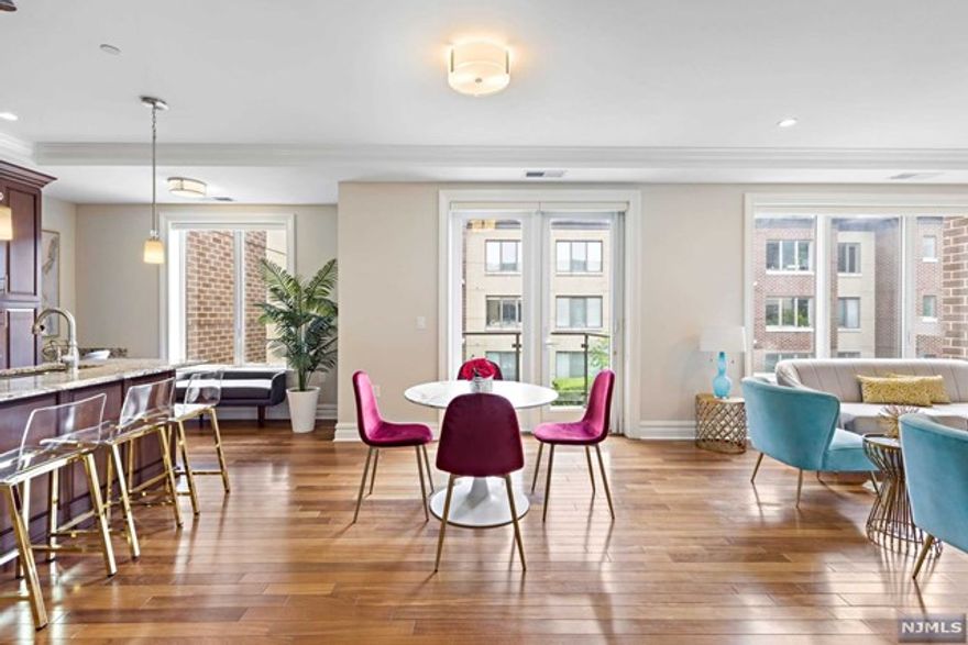 HENLEY ON HUDSON! SUPER-SIZED 1,064 SF SOUTH FACING 1B + DEN/ OFFICE + BALCONY + STORAGE LOCKER + WALK IN CLOSET + POWDER ROOM + LAUNDRY IN UNIT + 1 INDOOR PARKING SPACE + DREAM COMMUTE! Views of English Gardens& Courtyard from this fabulous architectural wonder! Crown moldings, soffits, recessed lighting & wood flooring throughout! Stainless Steel appliances, Marble spa w/ glass enclosed 5 ft separate shower & Deep soaking tub! Full size laundry in unit, 1 in building garage space, 8x4 storage unit to boot! Dream commute to NYC via NY WATERWAY FERRY (FREE SHUTTLE ON SITE), HUDSON LIGHT RAIL to PATH/NY MTA, or NJ TRANSIT BUS 158 to LINCOLN TUNNEL or GWB in a NY MINUTE! Port Imperial Hudson Riverwalk & DOG RUNS & Weehawken track & ball field! Come & see before this goes! Rent includes all of the above plus Gas, Amenities (CONCIERGE, OUTDOOR POOL, PLAYROOM, GYM, Yoga Rm, Event Rms, Cinema Rm, Firepit, BBQ)