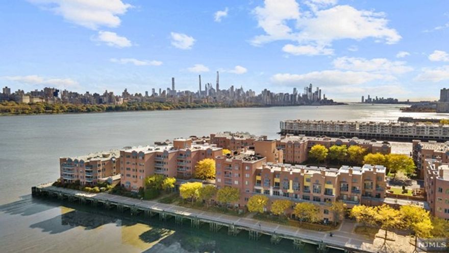 INDEPENDENCE HARBOR IN EDGEWATER HAS RIVERFRONT LUXURY AND CONVENIENCE ALL IN ONE. APPROXIMATELY 1500 SQUARE FEET BEAUTIFULLY RENOVATED FEATURING AN OPEN LAYOUT OF LIVING ROOM, KITCHEN AND DINING ROOM AND AN IMPRESSIVE PRIVATE OUTDOOR PATIO THAT ALMOST DOUBLES THE LIVING SPACE! ACCESS TO PATIO FROM LIVING ROOM AND PRIMARY SUITE WITH RIVER VIEWS YEAR ROUND. HIGH END FIXTURES AND APPLIANCES, TONS OF STORAGE IN THE KITCHEN CABINETS, CLOSETS IN THE HALLWAYS AND BEDROOMS. PRIMARY SUITE WITH 2 WALK IN CLOSETS AND PRIVATE BATH, 2ND BEDROOM ALSO HAS A DESIGNATED BATHROOM. HALF BATH IN ENTRANCE HALLWAY. NATURAL LIGHT FROM THE LARGE WINDOWS AND SLIDING DOORS ADD A WARMTH TO THE HOME AND CLEAN, SLEEK LINES, MARBLE COUNTERS AND HARDWOOD FLOORS MAKE ENTERTAINING A BREEZE. GREAT AMENITIES INCLUDE TENNIS, EXERCISE ROOM, OUTDOOR POOL, CHILDREN'S PLAYGROUND, 24 HR SECURITY, 1 DEEDED PARKING SPOT. PET FRIENDLY - DOG RUN. CLOSE TO SHOPPING, RESTAURANTS AND TRANSPORTATION TO NYC.