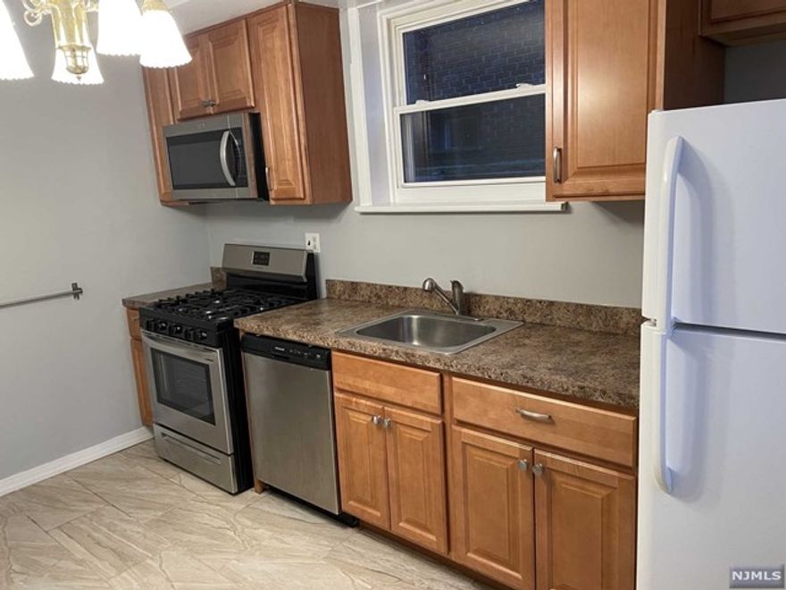 Spacious unit features brand new white subway tile bath, newer eat-in-kitchen including refrigerator, ss stove and dishwasher, microwave, freshly painted, hardwood floors throughout, plenty of deep closets, laundry facility on premises. Rent includes, heat, water, cooking gas all conveniently located near public transportation and major highways, colleges. No pets no exceptions. On Site Parking; Laundry Facilities On Premise; Available for immediate occupancy. Phone interview required prior to all appointments. Docuverus Tenant Application required.