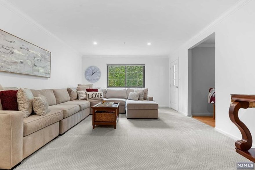 Welcome to Ridge Gardens! This gorgeous 3 BR 2.5 bath end unit has two floors of living space with two private balconies! Enjoy family gatherings in the massive living room and dining room, while you prepare dinner in the renovated kitchen featuring granite countertops, stainless steel appliances, cherry cabinetry and a breakfast nook! Retreat to the second floor where all three spacious bedrooms are located, including a large primary suite with walk in closet, primary bathroom with double sinks, and your very own private balcony. Tons of closets for storage, convenient 2nd floor laundry, plus another full bath round off the second floor. All this plus a one car garage, storage unit, and low taxes make this the perfect place to call home!