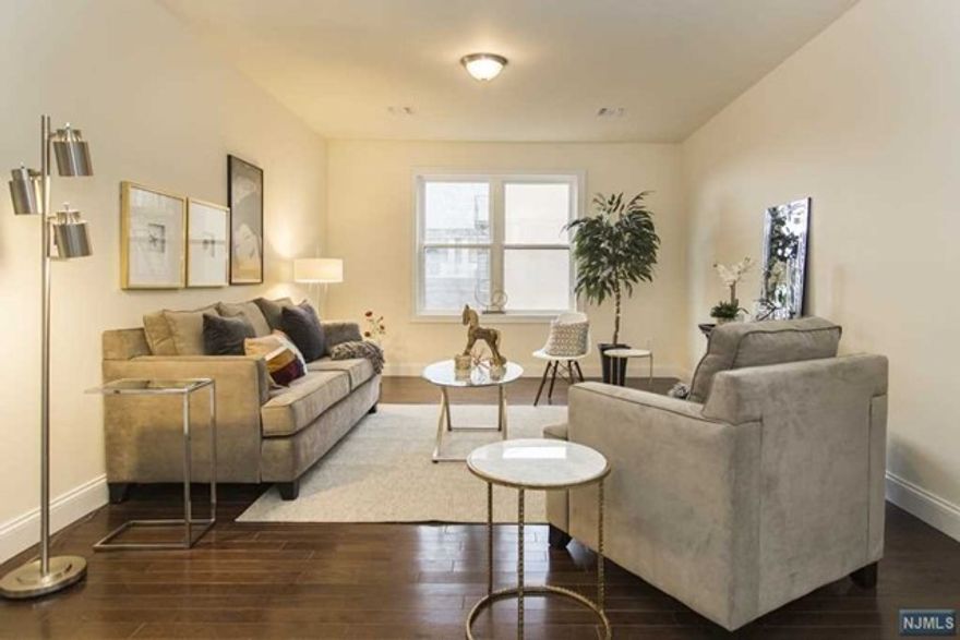 Welcome home to this fabulous 2 Bedroom condo at the Lofts at Lincoln Park in Newark. This beautiful home features a modern kitchen with ample cabinetry, stainless steel appliances, granite countertops, two private bedrooms, each with hardwood floors and separate closet space, two new baths with modern accents and clean finishes and an in unit washer and dryer. The expansive living room boasts hardwood floors and a great entertaining space. In addition, you will conveniently be situated nearby Penn station and other transportation options for a quick travel to NYC. For a day out on the town, you will be just minutes from parks, the Prudential Center, and an abundance of restaurants. The building offers secure entry, a gym and a secure garage with one car parking deeded to the unit.