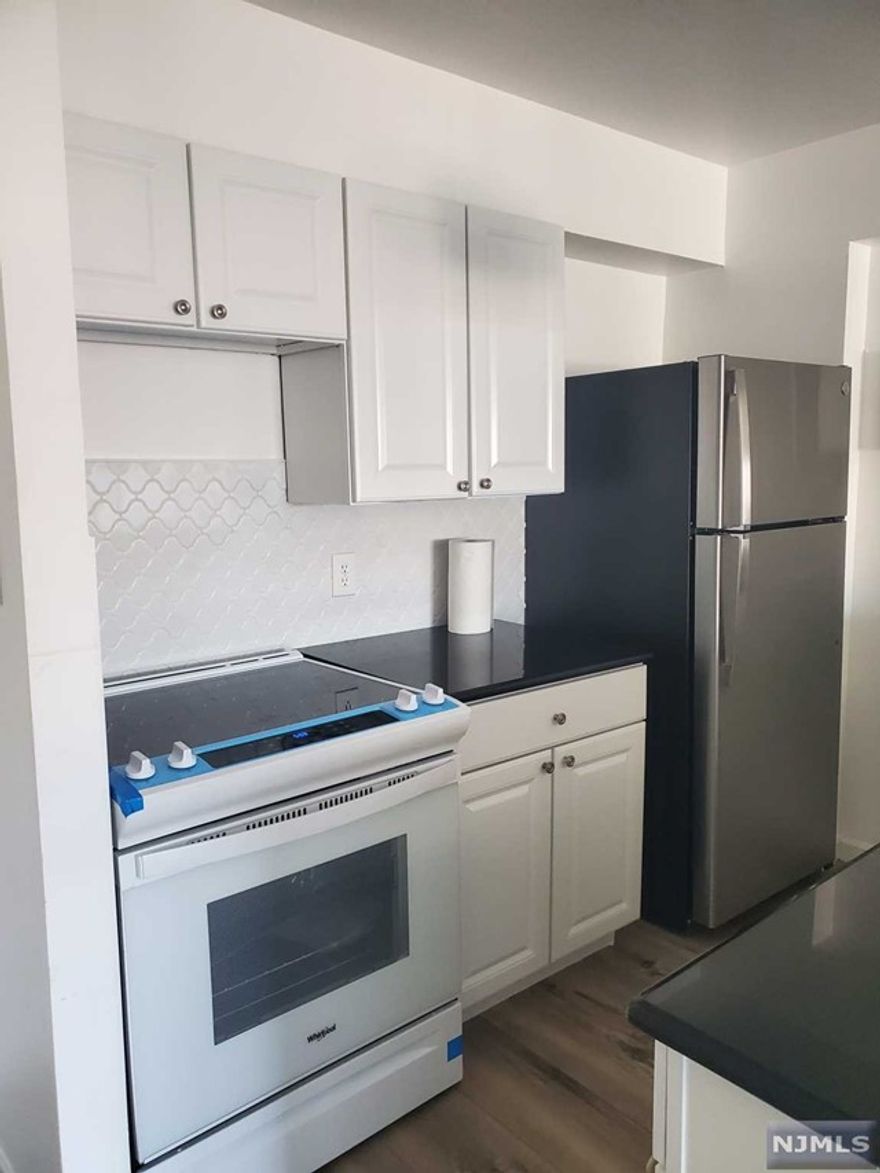 Updated Floor ( Living room Na Bed room), New Paint. Granite Counter Top with Breakfast bar. One parking Lot across the Street(#70), East Facing Bright & Modern Open Layout Unit. Walk to Shopping & restaurant. NY Bus. NO-Pets Building . Please text to Listing Agent (Charles Lee) or email Lockbox has been installed on the North Fence.