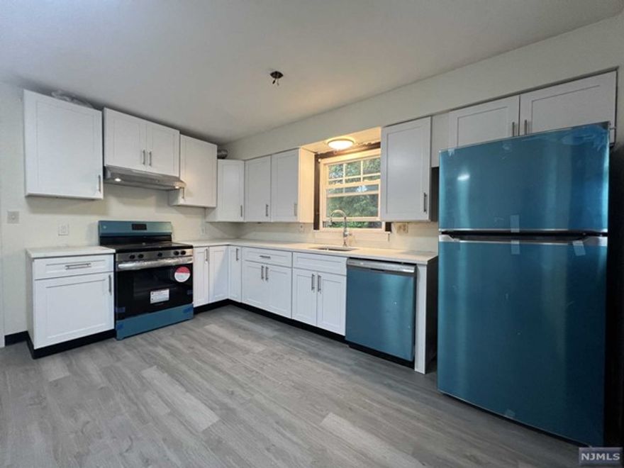 COMMUTERS DREAM! A CHARMING BRIGHT AND SPACIOUS 4-5 BED RMS 2 FULL NEWER BATH. LOCATED ON A EXCELLENT LOCATION. REFINISHED HARDWOOD FLOORS. COMPLETELY RENOVATED NEW KITCHEN. ALL STAINLESS STEEL APPLIANCES AND GRANITE COUNTERTOPS. PARTIAL FINISHED BASEMENT WITH OUTSIDE ENTRANCE TO A PRIVATE FENCED IN LARGE BACKYARD. ALSO THERE IS A FAMILY RM AND A REC RM. WASHER AND DRYER ARE INCLUDED "AS IS". CLOSE TO NYC TRANSPORTATION, PARKS, SHOPPING, DINING AND SCHOOLS. TENANT IS RESPONSIBLE FOR LAWN MAINTENANCE AND SNOW REMOVAL. AVAILABLE NOW.