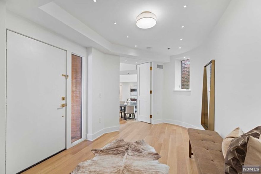 Originally designed by New York architectural firm French, Dixon & DeSaldern in 1891 and added to the National Register of Historic Places in 2006 The Raphael has been painstakingly restored and converted into a collection of beautiful and expansive custom-built homes located in Hoboken's desirable uptown Brownstone district. The developers have managed to perfectly complement this significant architecturally important and historic property with juxtaposing professionally designed modern interiors. Every residence offers unique architectural details including soaring double height ceilings, a bell tower studio, a turret and multiple terraces offering historic European like views of the both the building and surrounding streetscapes. Easy access to Hoboken's 14th Street NY Waterway Ferry and 1 block from Washington Street's boutique shopping, restaurants and the NJ Transit bus route for access to Manhattan's Port Authority. Owner paying parking for 1 year at municipal parking grg.