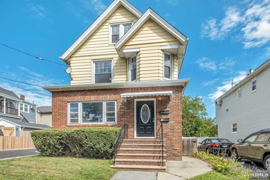 The sun-filled first floor unit features a large LR and 2 BRs, new hardwood floors, dining area & kitchen with granite counters & s/s appliances. No pets, street parking only. Shared Washer/dryer in basement. Tenant pays all utilities.