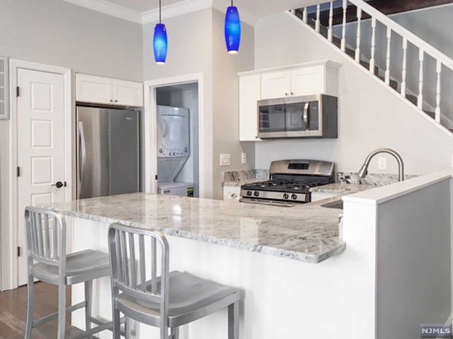 Rare opportunity to lease a renovated home in the heart of East Newark/Harrison, just a 15 minute walk to Harrison Path station. Fully gut renovated in 2018 with impeccable attention to detail. This 2 bedroom, 2 bath 850sqft home boasts a sleek open layout, 9ft+ ceilings, oak hardwood flooring, along with modern conveniences such as in-unit laundry, central air, and custom kitchen with granite counters, breakfast bar, stainless steel refrigerator, gas range, microwave, and dishwasher. Tenant responsible for 1.5-month security deposit and half month broker fee. Pets considered (addt'l fee).