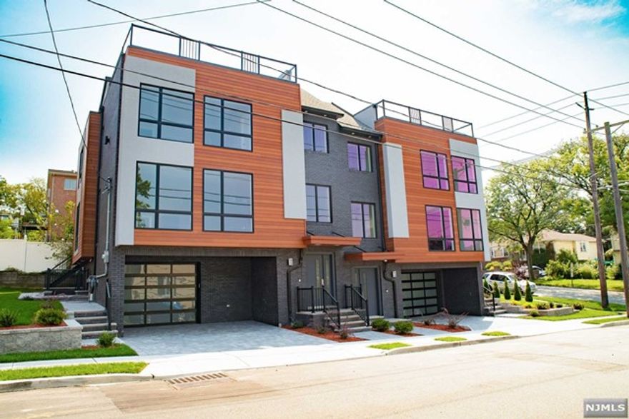 Welcome to one of a kind brand new contemporary duplex built by award winning The Mosaic Home Team with immaculate finishes including the top floor roof top! Main level features floor to ceiling windows, gas fireplace in living room, custom kitchen with high end SS appliances, dining room, half bathroom and a separate side door walkout. Second level boasts three good size bedrooms all with floor to ceiling windows, and 2 full bathrooms. Master suit has double walk in closets,master bath. Laundry room on bedrooms level. Third level features a wet bar area with a dishwasher and an additional 400sq ft of outdoor rooftop space perfect for gatherings! Ground floor has a recreation room with a side entrance ,half bathroom and garage. Extra features include a central vac, 3 zone heating, Ring doorbell, Eco friendly VRF Multi Zone Heating and Cooling System with built in humidifier and many more.. Located within close proximity to all major highways, schools, bus stops and shops