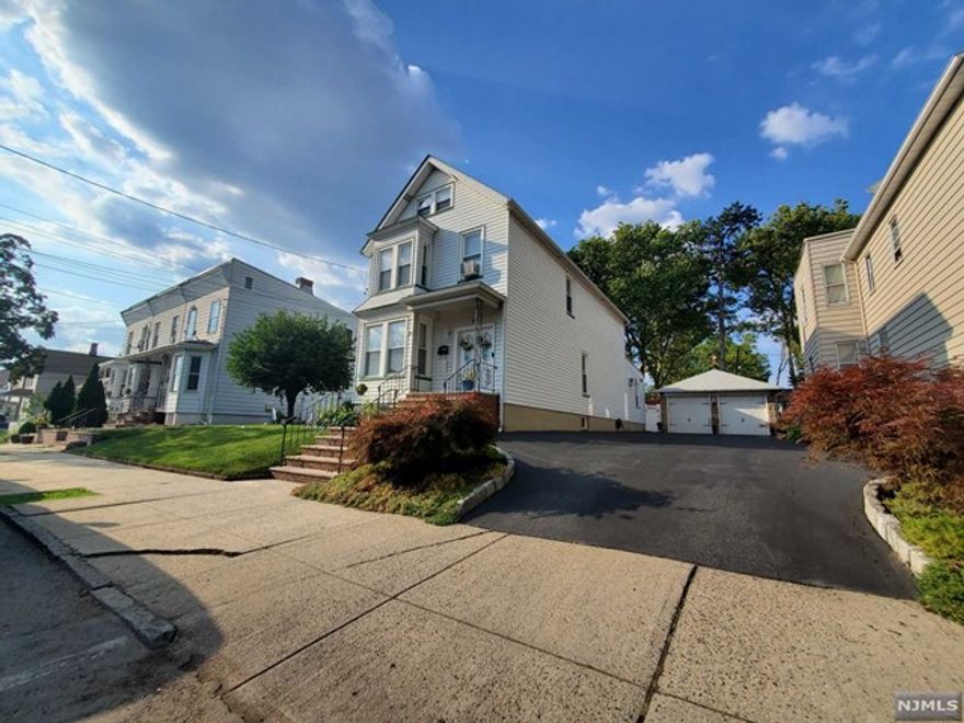 Beautifully well maintained 3 Bedroom Colonial House with 2 full baths and 1 half bath. Recently renovated kitchen. Plenty of Storage in the basement. Backyard patio and off street parking. 2 Car Garage. Right next to West Hudson Park.