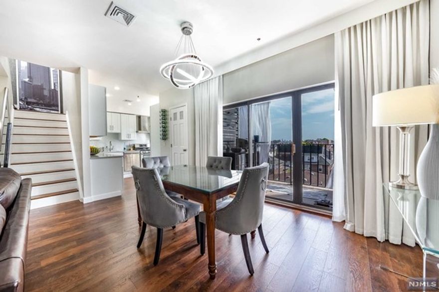 Exquisitely renovated 2 bedroom, 1.5 bath condo. Welcome to this modern and stylish & upgraded only a few years ago. With two levels and beautiful high ceilings, it features an open concept with living room, dining room, a fully equipped kitchen & a half bath on main level. Kitchen has been completely transformed with quartz countertops, stainless steel appliances. Bright, inundated with sunlight. Dining room opens up to the balcony, a space to wine down & relax w/beautiful NY views, absolutely unique! 2nd level features a spacious primary bedroom w/a walk in closet and NY views. 2nd bedroom offers a great size with closet. A gorgeous custom made full bath with natural marble, heated floors and a smart toilet. Laundry room with newer washer/dryer & lots of closet space. Every inch of this unit has been well used. 1 car parking deeded (inside garage). Located prominent area of North Bergen. Close to schools, parks & more! Sale contingent to seller finding a home. Special HOA asmt.