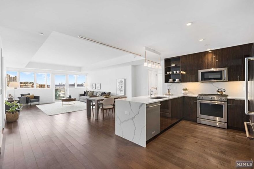 THE CHEN AGENCY (Phone: 201-346-8888) presents AVORA Residence 403 - This rare floorplan offers an impressive 1694-sf plus a full length terrace all boasting northeast views of the Hudson River and Manhattan Skyline. Truly generous room dimensions grace this ideal split-bedroom layout. Spectacular finishes include beautiful wood floors, quartz waterfall counters, contemporary cabinetry, exquisite porcelain tile, high-end stainless steel appliances, custom window blinds and a curated selection of beautiful hardware & fittings. Building amenities include 24-hour concierge service, health club, media room, sports simulator, resident lounges and the amazing 3rd floor pool deck & barbecue patio. Avora residents enjoy NY Waterway Ferry service, Hudson/Bergen Light Rail & NJ Transit Bus service literally steps from the lobby door. Come experience living here! Contact NELSON CHEN 201-886-8000 or Nelson@ChenAgency.com