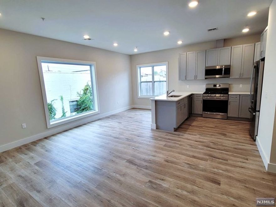 ONE MONTH FREE RENT!!! BRAND NEW CONSTRUCTION Apartment is ready to be Your New Home! Over 1200sf of Modern Layout featuring an Open Concept with Large Windows for tons of Natural Light to shine in! Beautifully Designed Kitchen features Quartz Counters with Brand New Stainless Steel Appliances. Primary Bedroom Suite features Custom Walk-in Closet and Spacious Bathroom with Double Sink Vanity. Central Air, Recessed Lighting and Washer/Dryer in unit for your convenience! Conveniently located close to everything, walking distance to Anderson St. Train Station, Bus Stop, Restaurants, Markets, Shops, etc. Sorry, no smoking and no pets allowed. Owner has NJ Real Estate License.